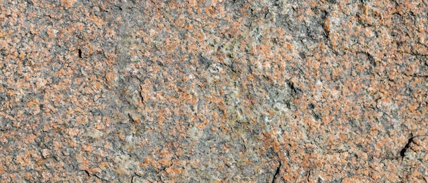 Granite stone surface texture. Texture of rough granit stone surface background. Abstract background from natural material