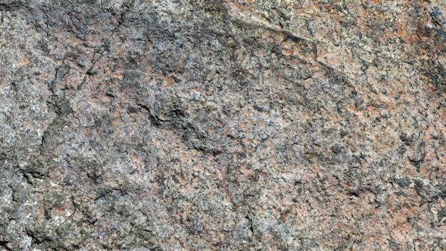 Granite stone surface texture. Texture of rough granit stone surface background. Abstract background from natural material