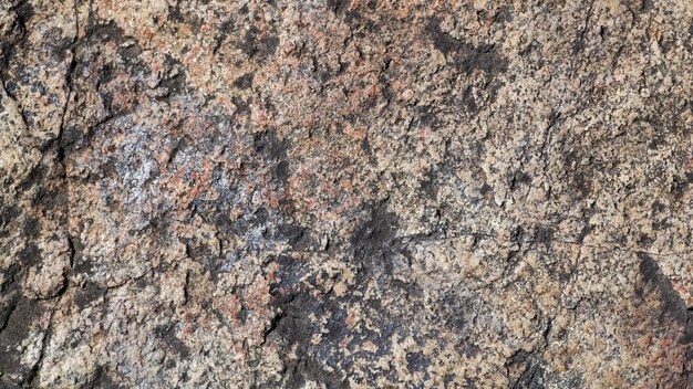 Photo granite stone surface texture. texture of rough granit stone surface background. abstract background from natural material