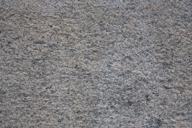 Гранитная текстура, фон, гранитный камень, используемый для отделки зданий, столешниц, полов и других архитектурных идей.