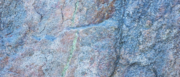 Foto texture del granito rocce di granito con superficie porosa sfondamento di pietra solida