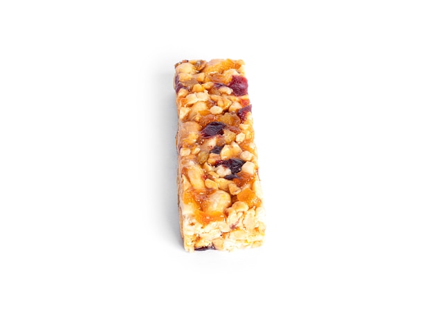 Photo granola bar with nuts and dried fruits isolated on a white background. high quality photo