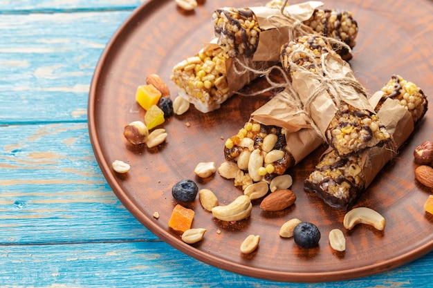 Granola bar on wooden background