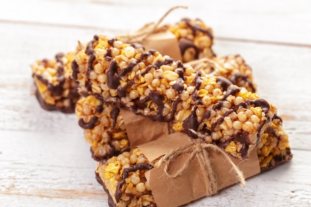 Granola bar on wooden background