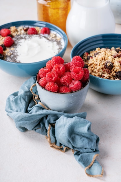 Granola breakfast in ceramic bowl