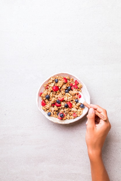 Granola Cereal with Strawberries and blueberries