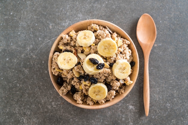 granola with banana, raisin and milk 