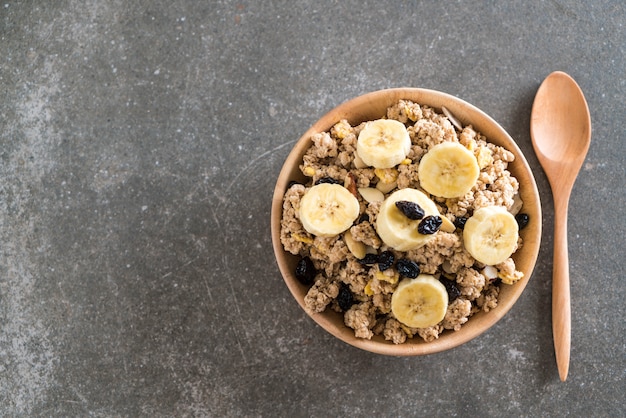 granola with banana, raisin and milk 