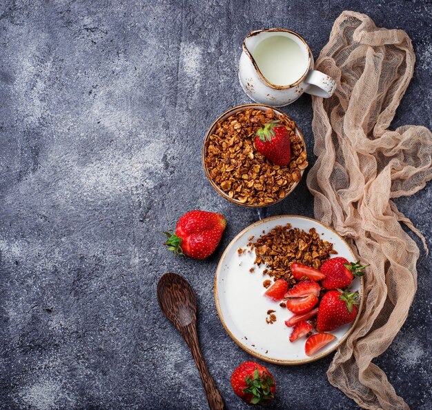 Granola with yogurt and strawberries 