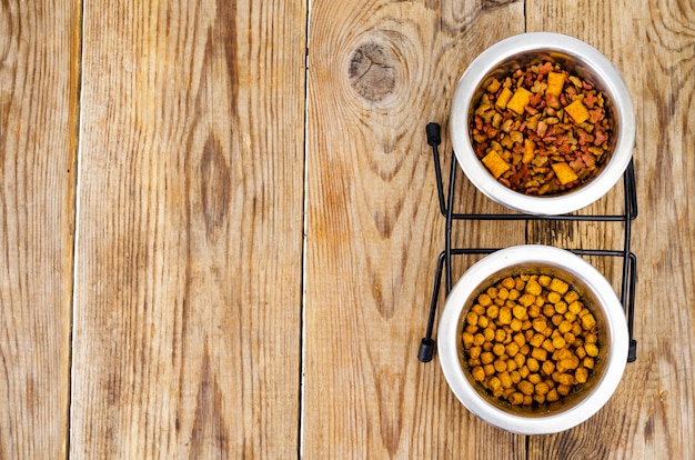 Granular pet food on brown wood table