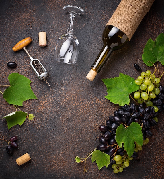 Grape, wine and vintage corkscrew