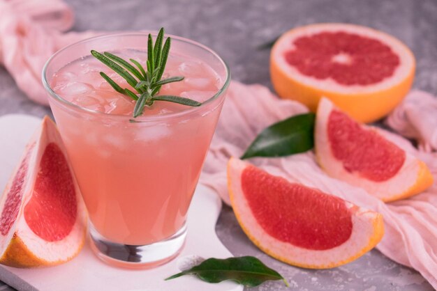 Grapefruit drink with ice Closeup