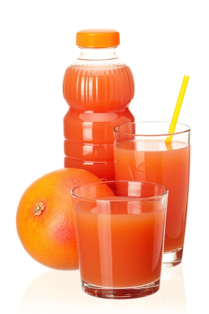 Grapefruit juice in plastic bottle and grapefruit fruits on white background