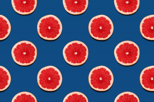 Grapefruit slices seamless pattern