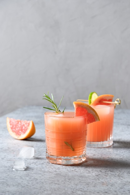 Grapefruit sparkling cocktail with lime garnish