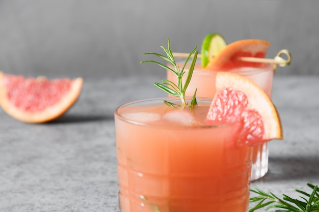 Grapefruit sparkling cocktail with lime garnish