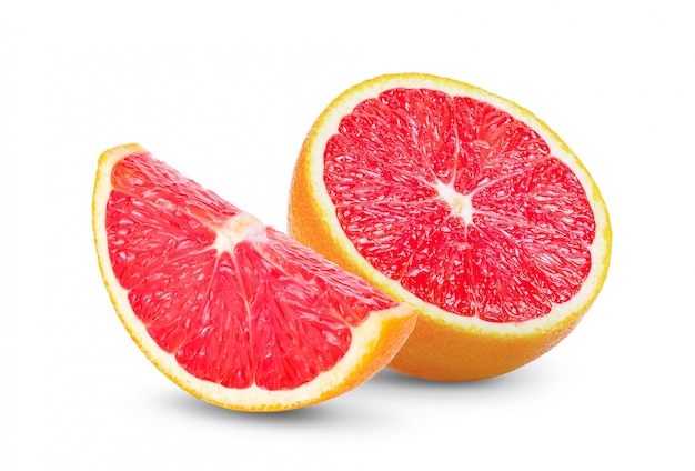 grapefruit with slice on white wall