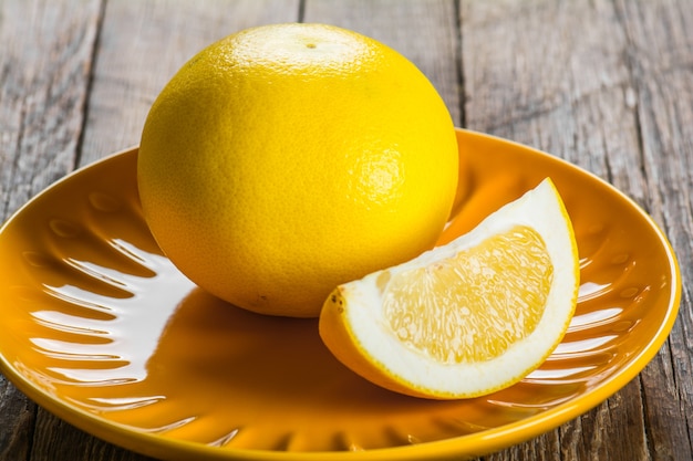 Grapefruit on a wooden table