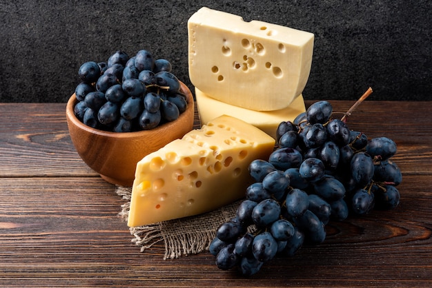 grapes and cheese on table