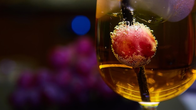 Grapes floating in champagne creating lots of bubbles