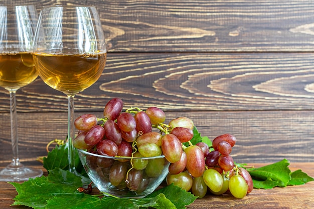 Grapes and glasses of wine