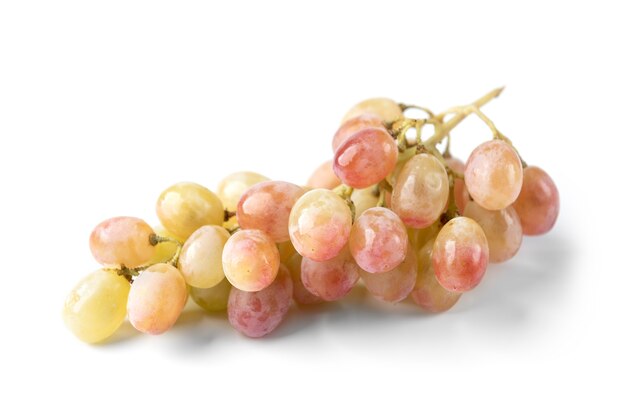 Grapes isolated on white surface.