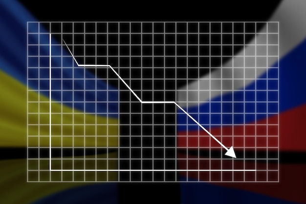 graph of the fall against the background of the flags of ukraine and russia  closeup
