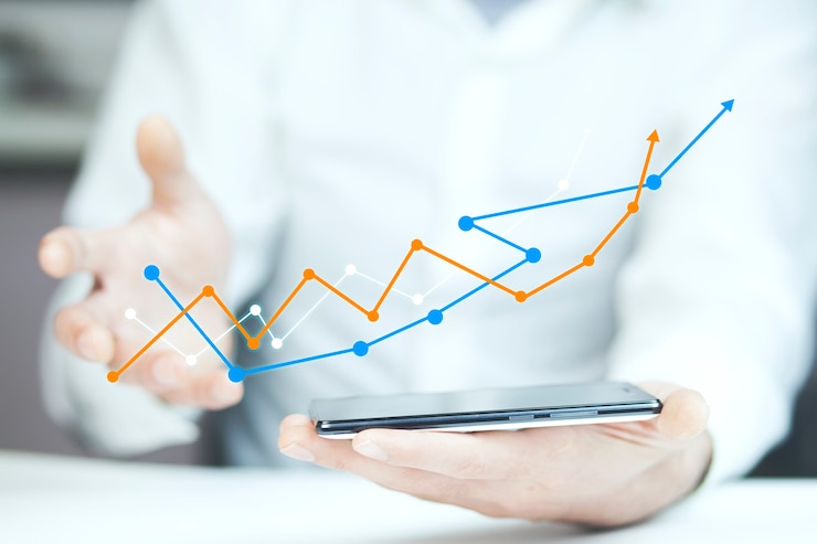 Photo graph growth in phone screen in man hand