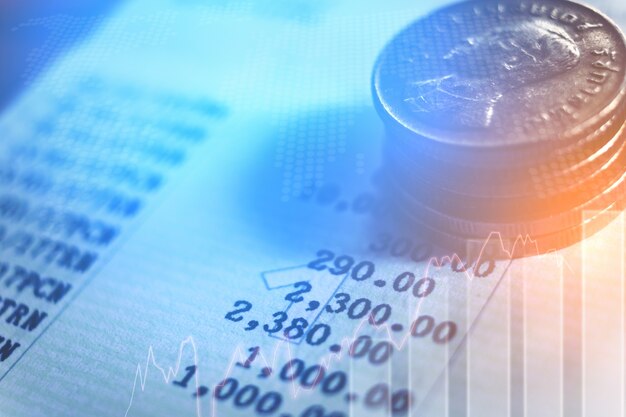  graph on rows of coins for finance and banking concept