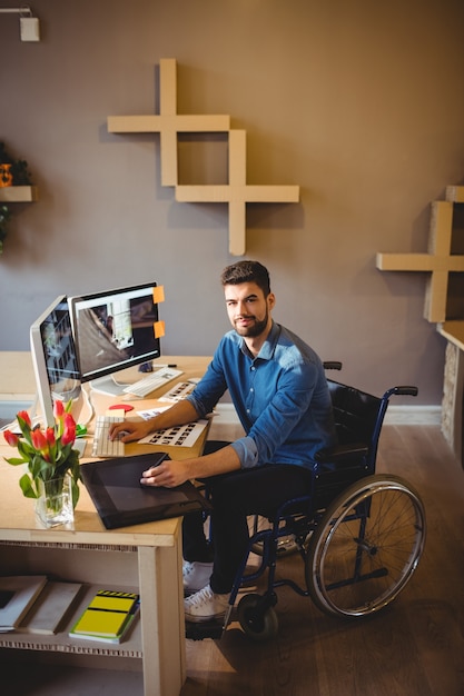 Graphic designer using a graphics tablet