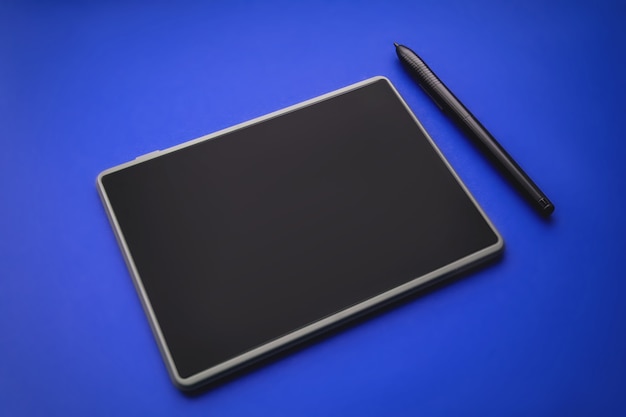 Graphics tablet Pen Touch on blue background.