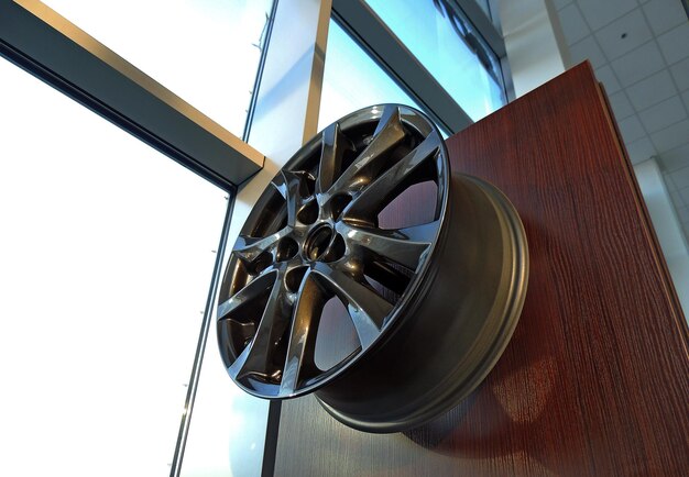 Graphite Painted Car Rim Displayed In Auto Parts Shop