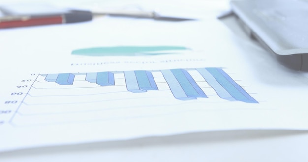 Graphs charts business table workplace of business people