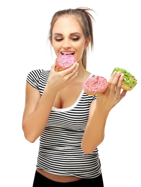 Grappig meisje en kleurrijke donuts