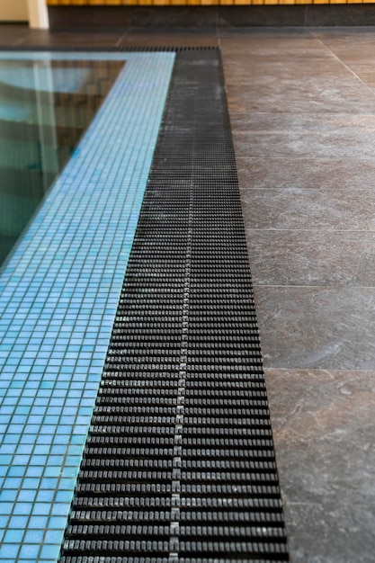 Grate drain water in the pool with a grate