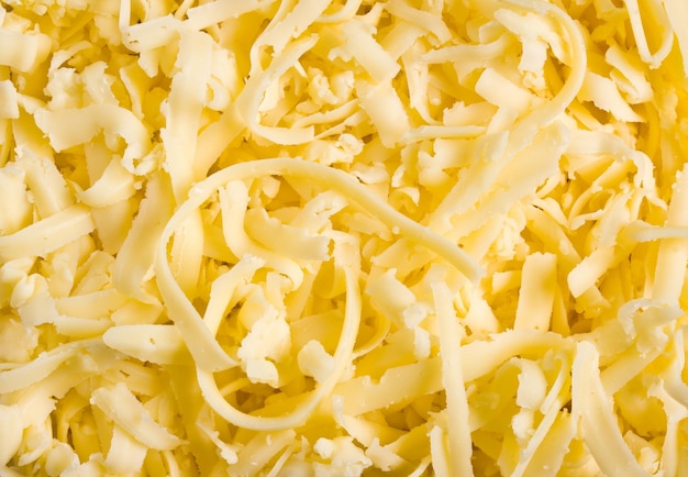 Grated pizza cheese mozarella close up