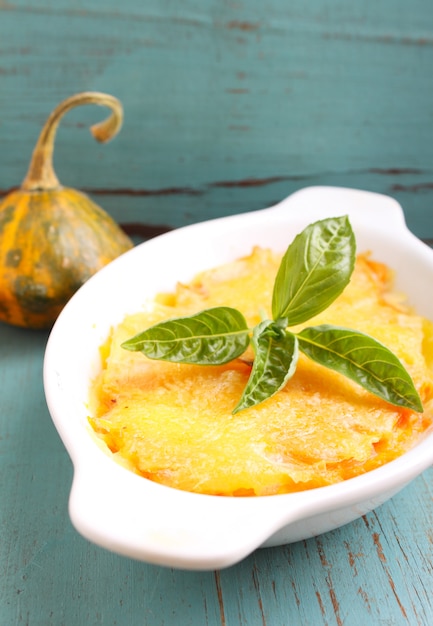 Gratin potatoes and pumpkin with milk