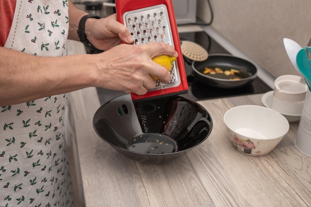 Grating Lemon Zest into Bowl