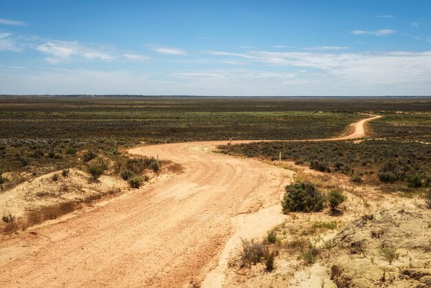 Gravel road through the mungo national park australia