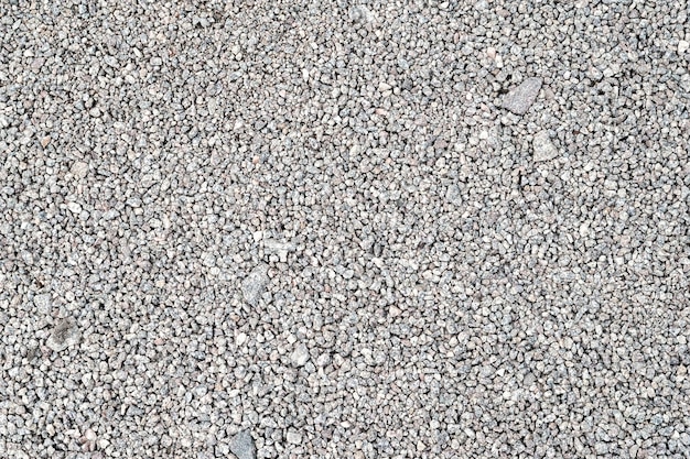 Gravel texture fine light gray granite stone gravel natural
textural background