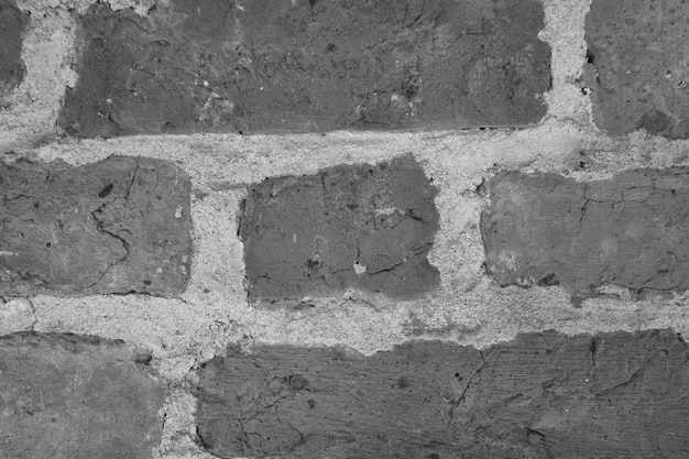 Photo a gray background of a brick wall brick texture pattern