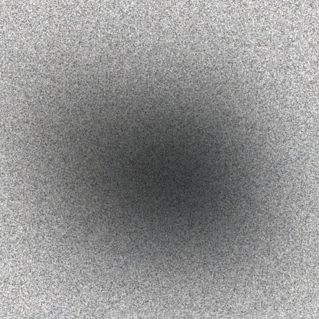 灰色の背景に黒い穴がある