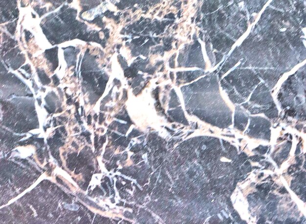 灰色の黒い大理石のスラブ表面の抽象的な背景