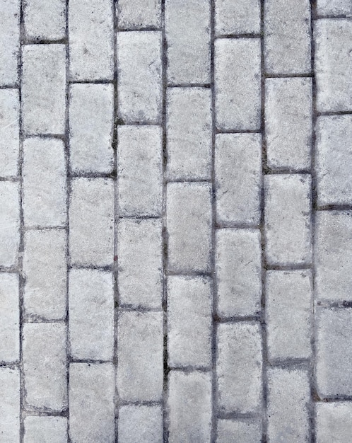 Gray brick stone pavement texture background