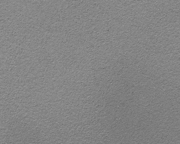 背景、コンクリートの壁のための灰色のセメントの表面。