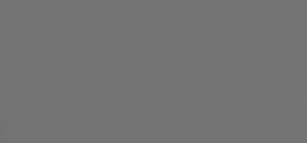 Фон серой цементной стеныТекстура поверхности Серая краска Темно-черный материал Структура здания Строительный фонИнтерьер сырой комнаты Студия Макет дисплеяПустое свободное пространство для презентации продуктов