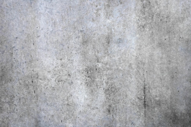 背景の灰色のセメント壁またはコンクリート表面のテクスチャ