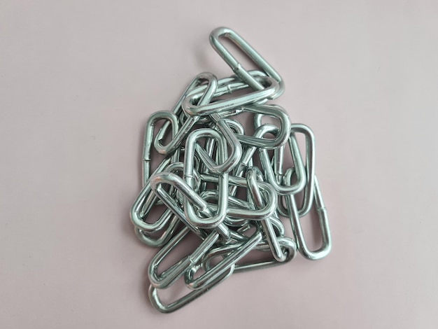 Gray chain stacked in pile steel metal iron chain