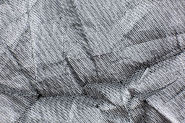 Gray Crumpled braided cotton net texture background Close up