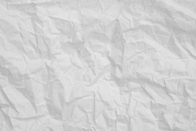 Gray crumpled paper empty background.texture of gray creased paper